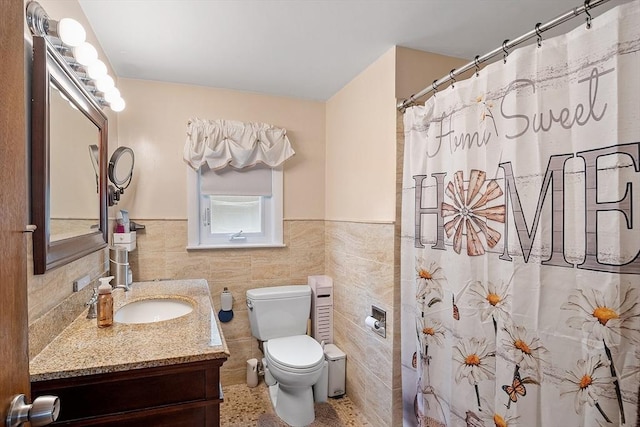 381 Water, Wakefield, MA 01880 - full bathroom with vanity, tile walls, wainscoting, and a shower with shower curtain