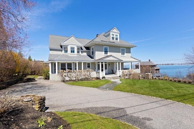 11 Paige St, Hingham, MA 02043 - shingle-style home featuring covered porch, a front yard, asphalt driveway, and a shingled roof