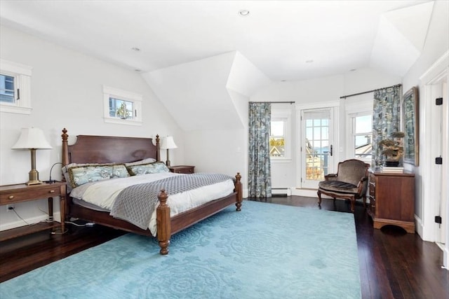 11 Paige St, Hingham, MA 02043 - bedroom with lofted ceiling, wood-type flooring, multiple windows, and baseboard heating