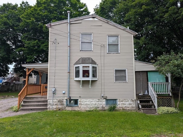8 May St, Webster, MA 01570 - rear view of property featuring a yard and covered porch