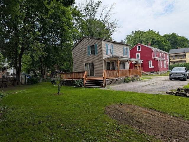8 May St, Webster, MA 01570 - rear view of property with a lawn and a deck