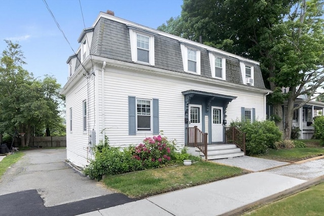 56 Bridge St Unit 56, Beverly, MA 01915 - view of front of property with mansard roof and roof with shingles
