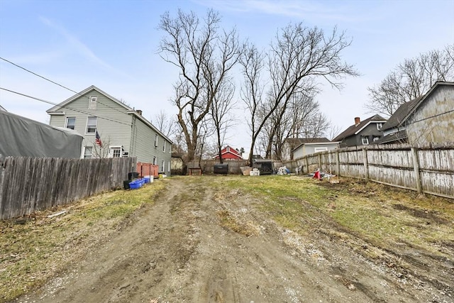 view of yard with a fenced backyard