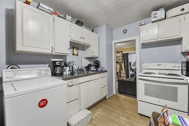 kitchen with a sink, washer / dryer, light wood-style flooring, white cabinets, and white electric stove