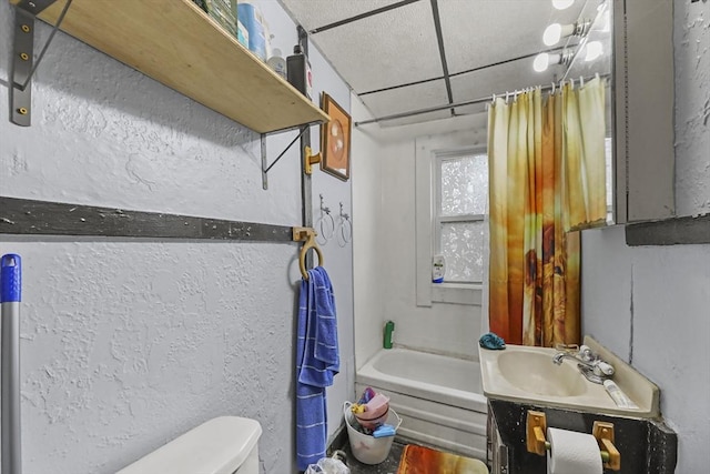 full bathroom with a bathing tub, vanity, a shower with shower curtain, and toilet