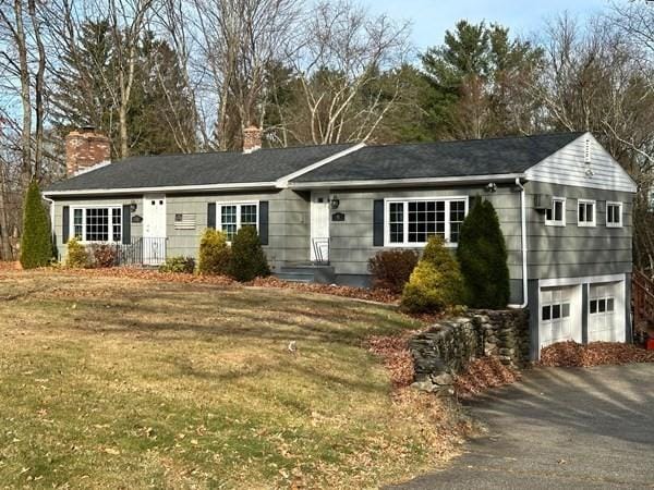 91 W Main St, West Brookfield, MA 01585 - single story home with an attached garage, a front lawn, a chimney, and aphalt driveway
