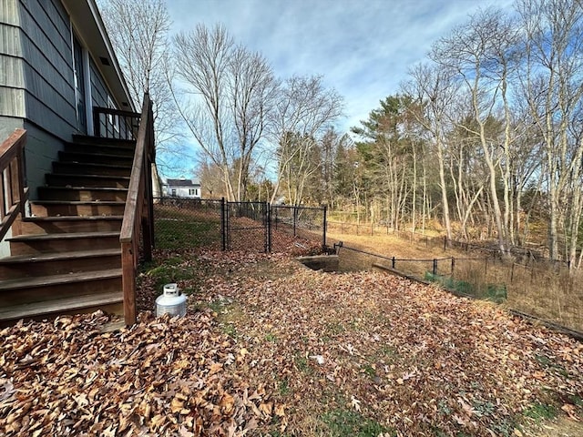 91 W Main St, West Brookfield, MA 01585 - view of yard featuring a gate, stairway, and fence