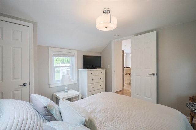5 Birch Hill Rd, Dennis, MA 02639 - bedroom with lofted ceiling, light wood-style floors, and baseboards