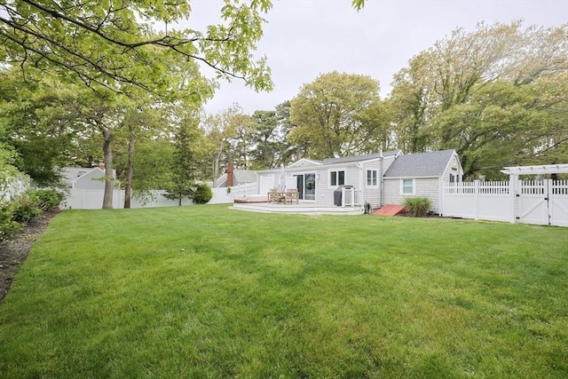 5 Birch Hill Rd, Dennis, MA 02639 - back of property featuring a patio area