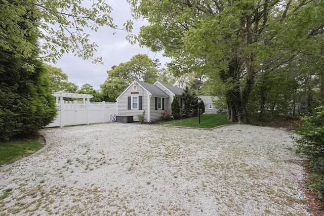 5 Birch Hill Rd, Dennis, MA 02639 - view of side of property featuring a pergola