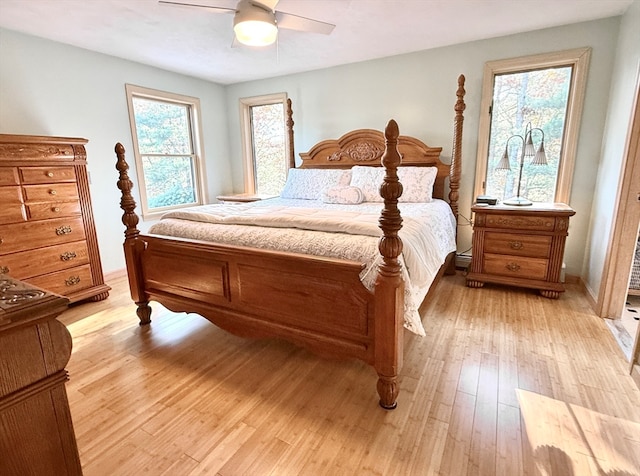 bedroom featuring light wood-type flooring and ceiling fan