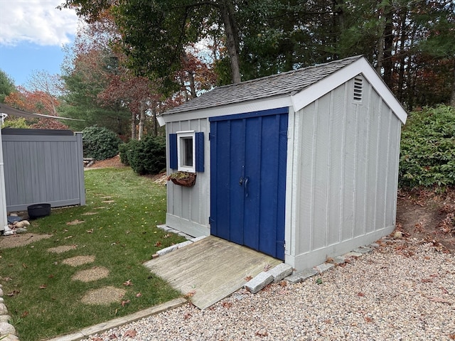 view of outdoor structure with a yard