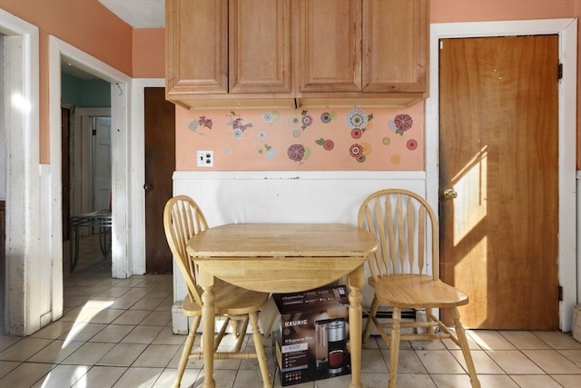 dining area with light tile patterned flooring