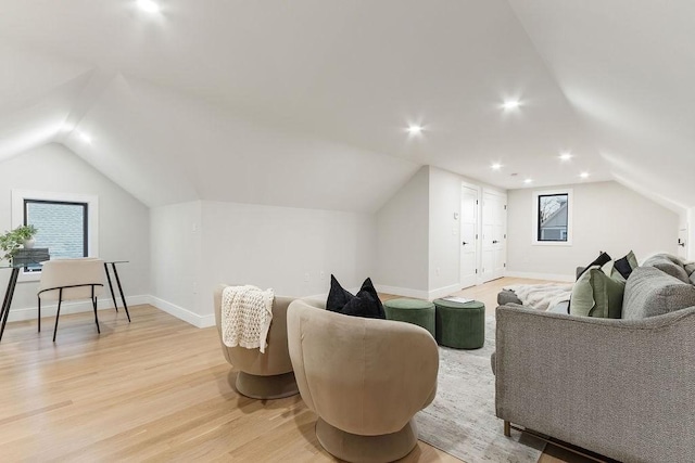 354 Linwood Ave Unit 354, Newton, MA 02460 - living area with light wood-style floors, lofted ceiling, and baseboards