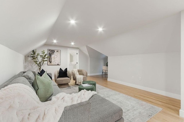 354 Linwood Ave Unit 354, Newton, MA 02460 - living area featuring light wood finished floors, baseboards, lofted ceiling, and recessed lighting