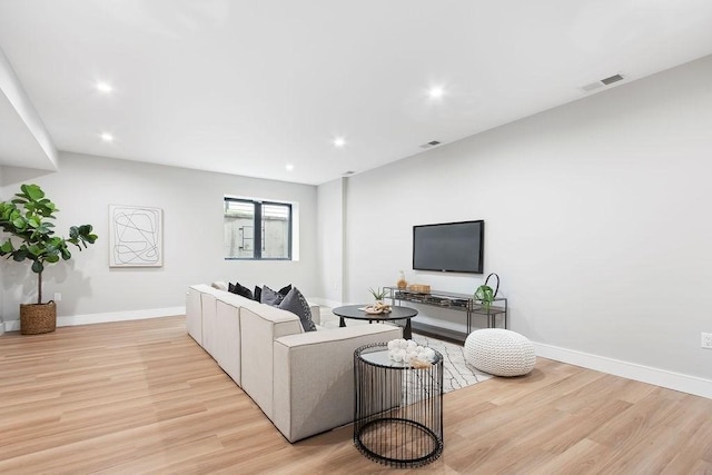 354 Linwood Ave Unit 354, Newton, MA 02460 - living area featuring light wood finished floors, recessed lighting, and baseboards