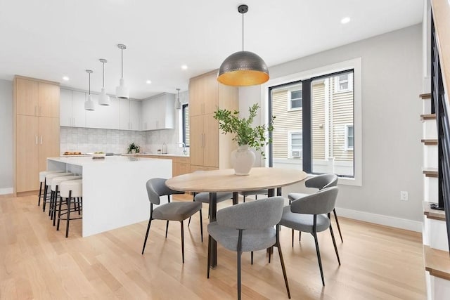 354 Linwood Ave Unit 354, Newton, MA 02460 - dining area featuring light wood-type flooring, healthy amount of natural light, recessed lighting, and baseboards