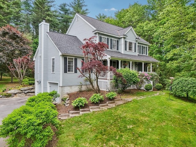 176 Crescent St, Stow, MA 01775 - colonial home with roof with shingles, a chimney, driveway, a front yard, and covered porch