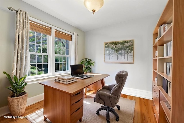 176 Crescent St, Stow, MA 01775 - office area with baseboards and light wood finished floors