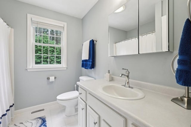 176 Crescent St, Stow, MA 01775 - bathroom featuring vanity, toilet, baseboards, and tile patterned flooring