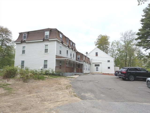 3 S Shore Rd, Salem, NH 03079 - view of home's exterior featuring mansard roof and a shingled roof