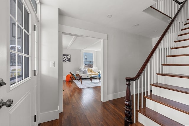 entryway featuring dark wood-type flooring