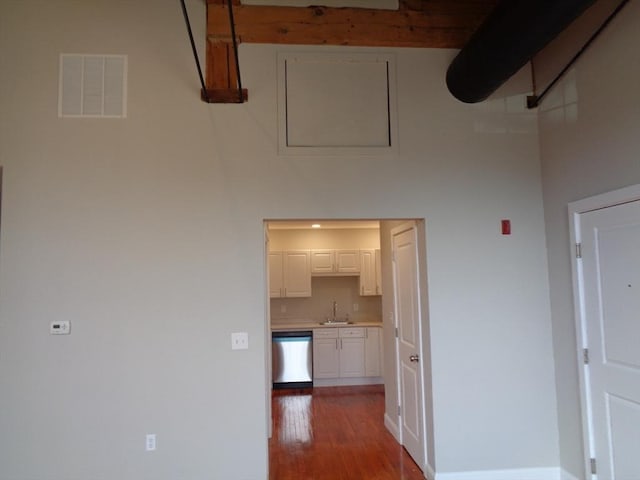 12 Brookside Rd Unit 20, Westford, MA 01886 - hallway featuring wood finished floors, a sink, a high ceiling, and baseboards