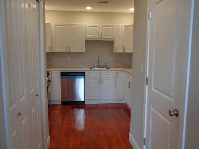12 Brookside Rd Unit 20, Westford, MA 01886 - kitchen featuring stainless steel dishwasher, a sink, white cabinetry, light countertops, and dark wood finished floors