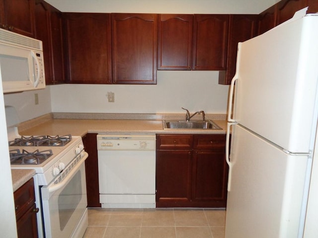 12 Brookside Rd Unit 20, Westford, MA 01886 - kitchen featuring white appliances, a sink, light countertops, dark brown cabinets, and light tile patterned floors