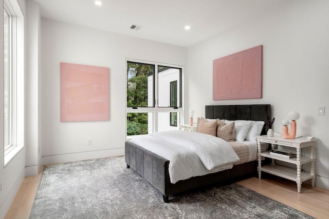 bedroom with wood-type flooring