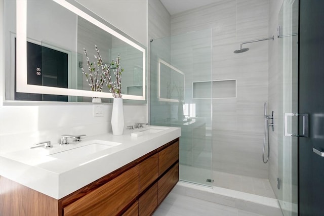 bathroom with vanity and an enclosed shower