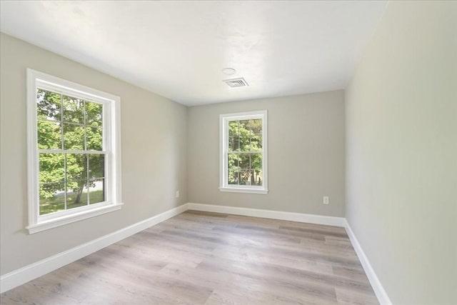 1009 Point Rd, Marion, MA 02738 - spare room featuring light wood-type flooring and baseboards