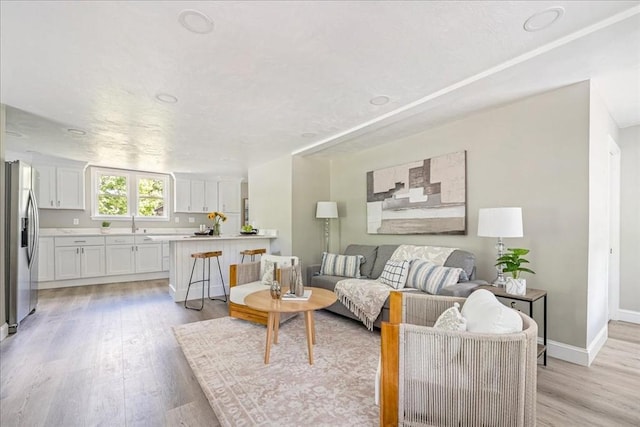 1009 Point Rd, Marion, MA 02738 - living area with light wood finished floors and baseboards