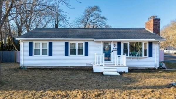 view of front of house with a front yard