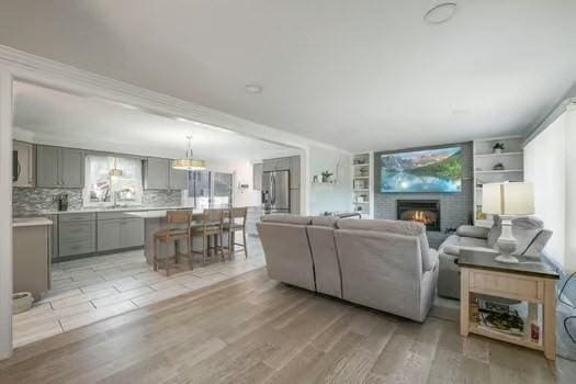 living room with light hardwood / wood-style flooring