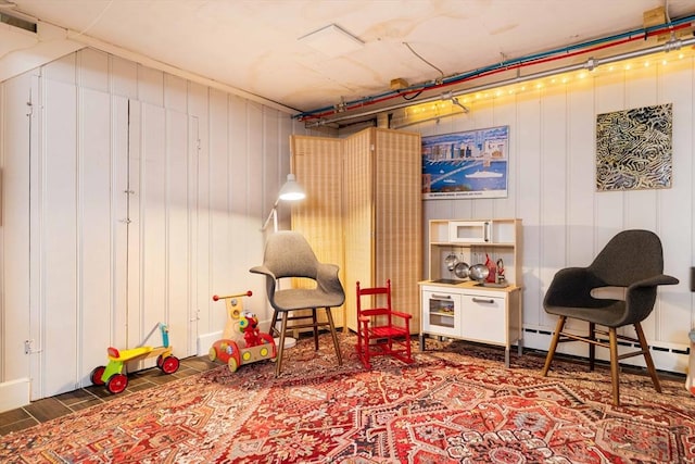 playroom with a baseboard radiator