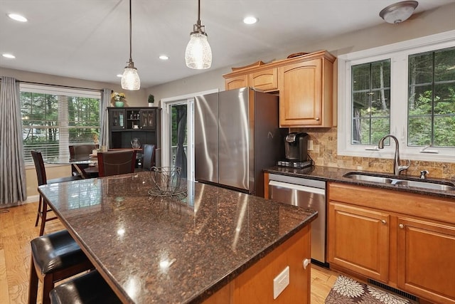 21 Rose Ln, Uxbridge, MA 01569 - kitchen with appliances with stainless steel finishes, a sink, recessed lighting, tasteful backsplash, and pendant lighting