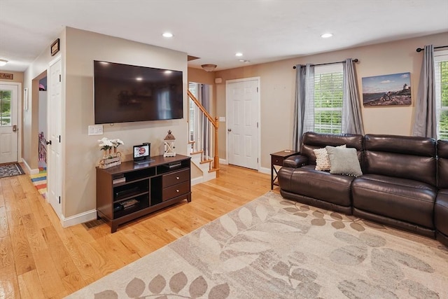 21 Rose Ln, Uxbridge, MA 01569 - living area featuring stairs, light wood-style flooring, baseboards, and recessed lighting
