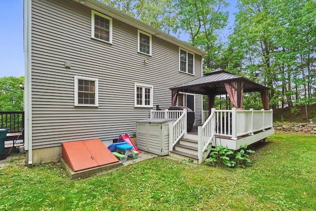 21 Rose Ln, Uxbridge, MA 01569 - rear view of house with a gazebo, a deck, and a lawn