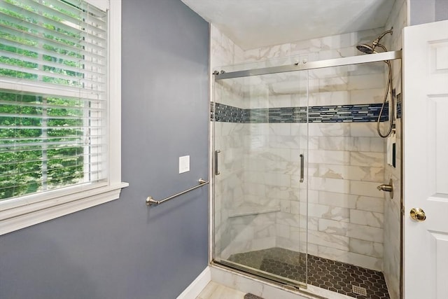 21 Rose Ln, Uxbridge, MA 01569 - bathroom with a shower stall and baseboards