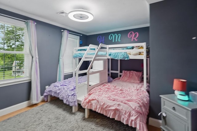21 Rose Ln, Uxbridge, MA 01569 - bedroom featuring multiple windows, crown molding, baseboards, and wood finished floors