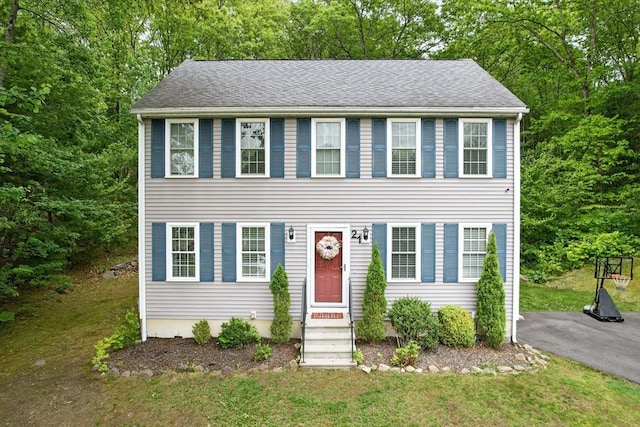 21 Rose Ln, Uxbridge, MA 01569 - colonial-style house with a front lawn and roof with shingles