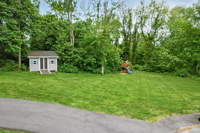 21 Rose Ln, Uxbridge, MA 01569 - view of grassy yard featuring a playground