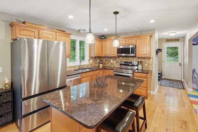 21 Rose Ln, Uxbridge, MA 01569 - kitchen featuring stainless steel appliances, a sink, plenty of natural light, decorative backsplash, and recessed lighting