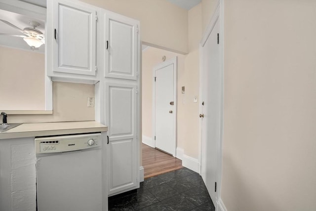 369 Tappan St Unit 8, Brookline, MA 02445 - kitchen with white dishwasher, white cabinets, light countertops, and ceiling fan