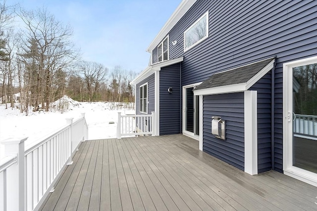 view of snow covered deck