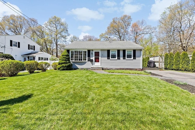 view of front of house with a front lawn
