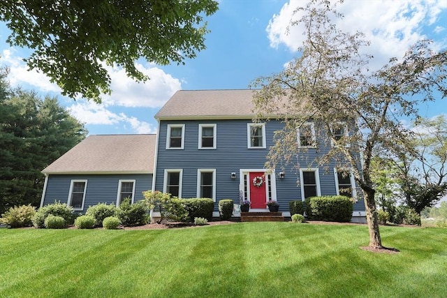 70 Huntsbridge Rd, North Attleboro, MA 02760 - colonial-style house featuring a front lawn and roof with shingles