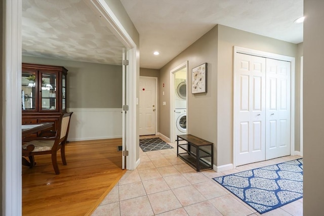 70 Huntsbridge Rd, North Attleboro, MA 02760 - entryway featuring stacked washer / dryer, recessed lighting, and light tile patterned floors
