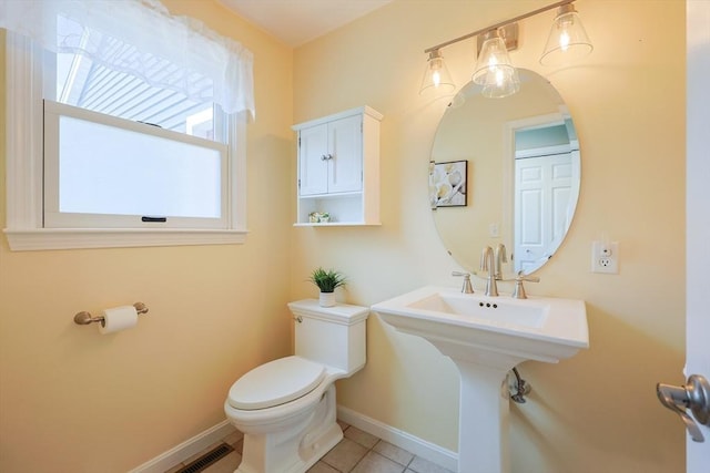 70 Huntsbridge Rd, North Attleboro, MA 02760 - half bathroom with toilet and tile patterned floors